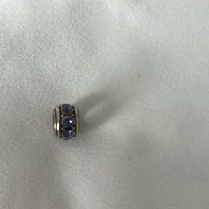 Brighton purple spacer bead gently loved.